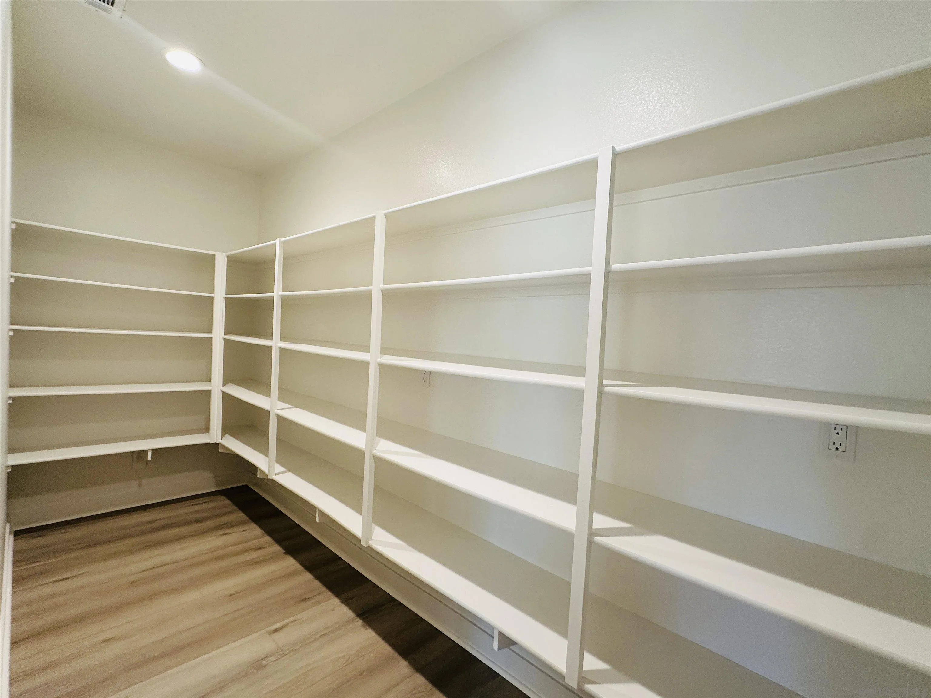 13765 Holly Oak Way Poway, CA 92064 - Photo 5 of 18 a view of walk in closet with empty racks