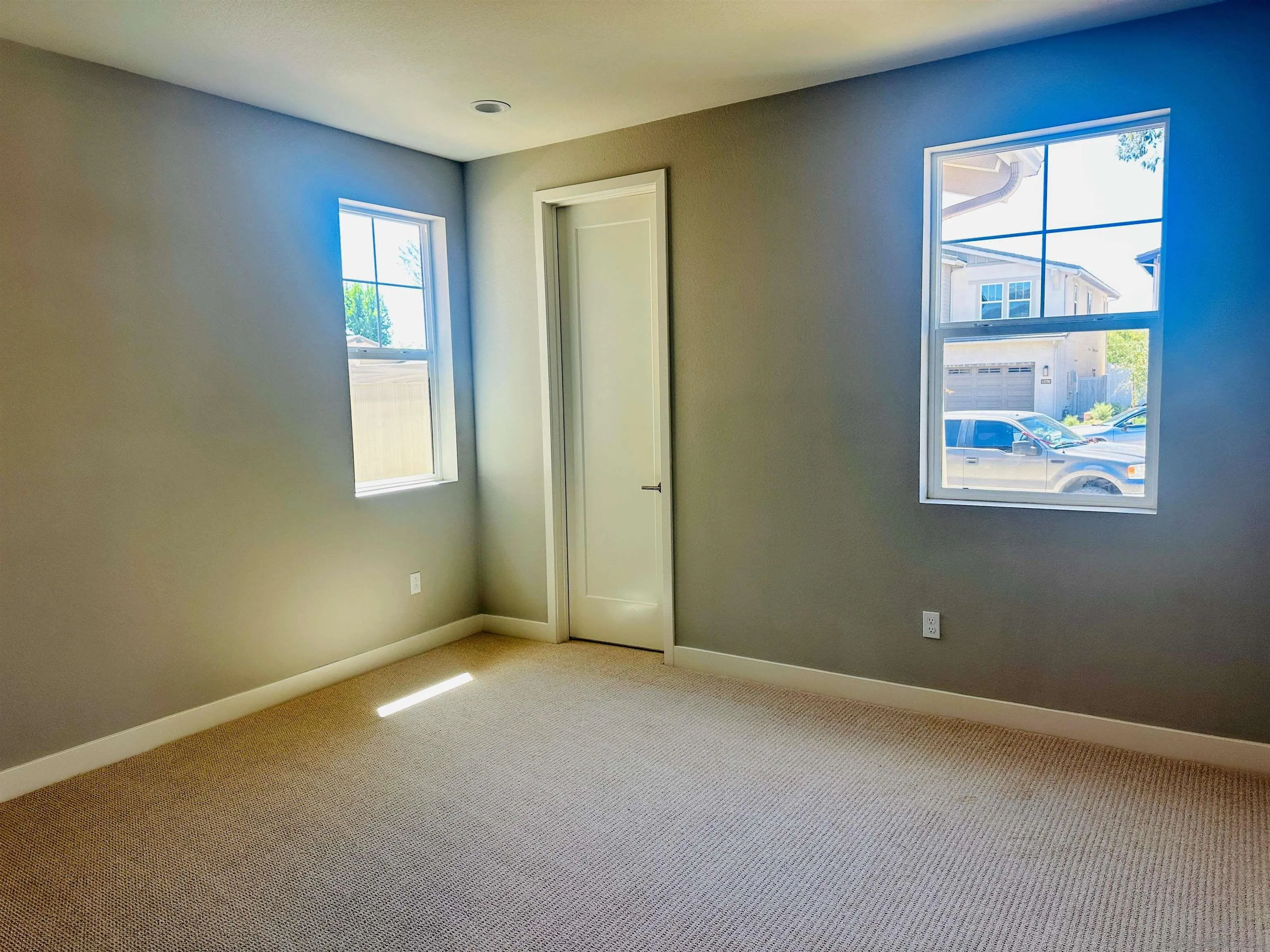 13765 Holly Oak Way Poway, CA 92064 - Photo 9 of 18 an empty room with windows
