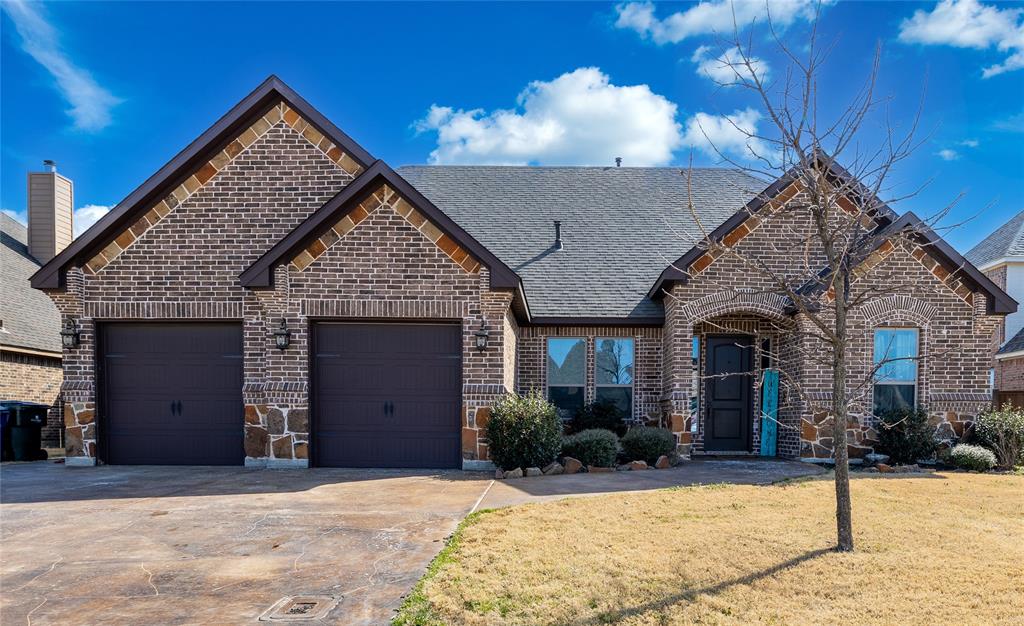 723 La Paloma Road Sanger, TX 76266 - Photo 1 of 1 a front view of a house with a yard