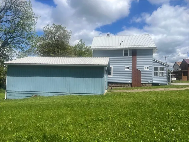 a house view with a garden space