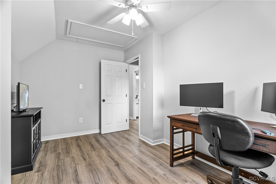7018 Pointer Ridge Road Midlothian, VA 23112 - Photo 20 of 27 a view of a workspace with furniture and a flat screen tv