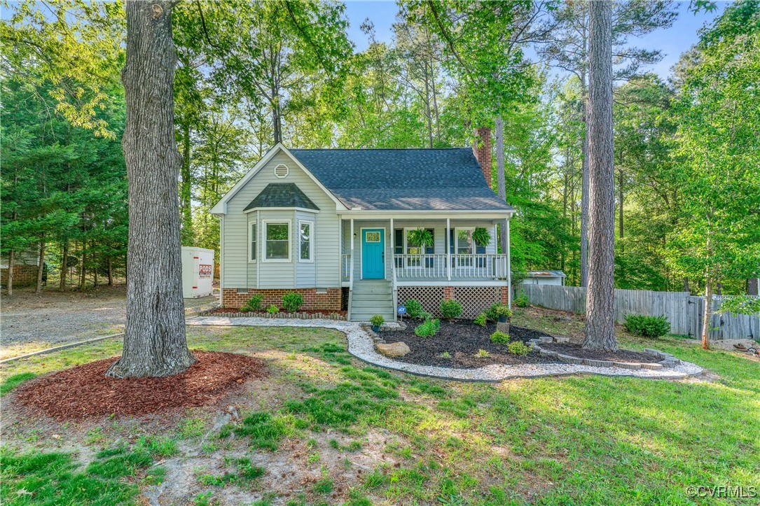 7018 Pointer Ridge Road Midlothian, VA 23112 - Photo 2 of 27 a view of a house with a yard and sitting area
