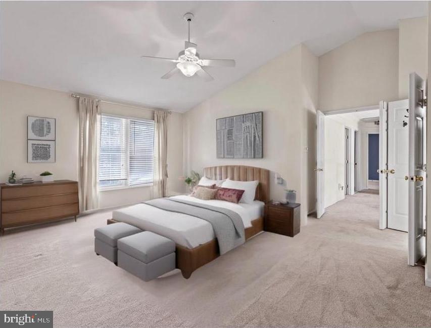 1505 Ridge Forest Way Hanover, MD 21076 - Photo 16 of 40 a spacious bedroom with a bed and a chandelier