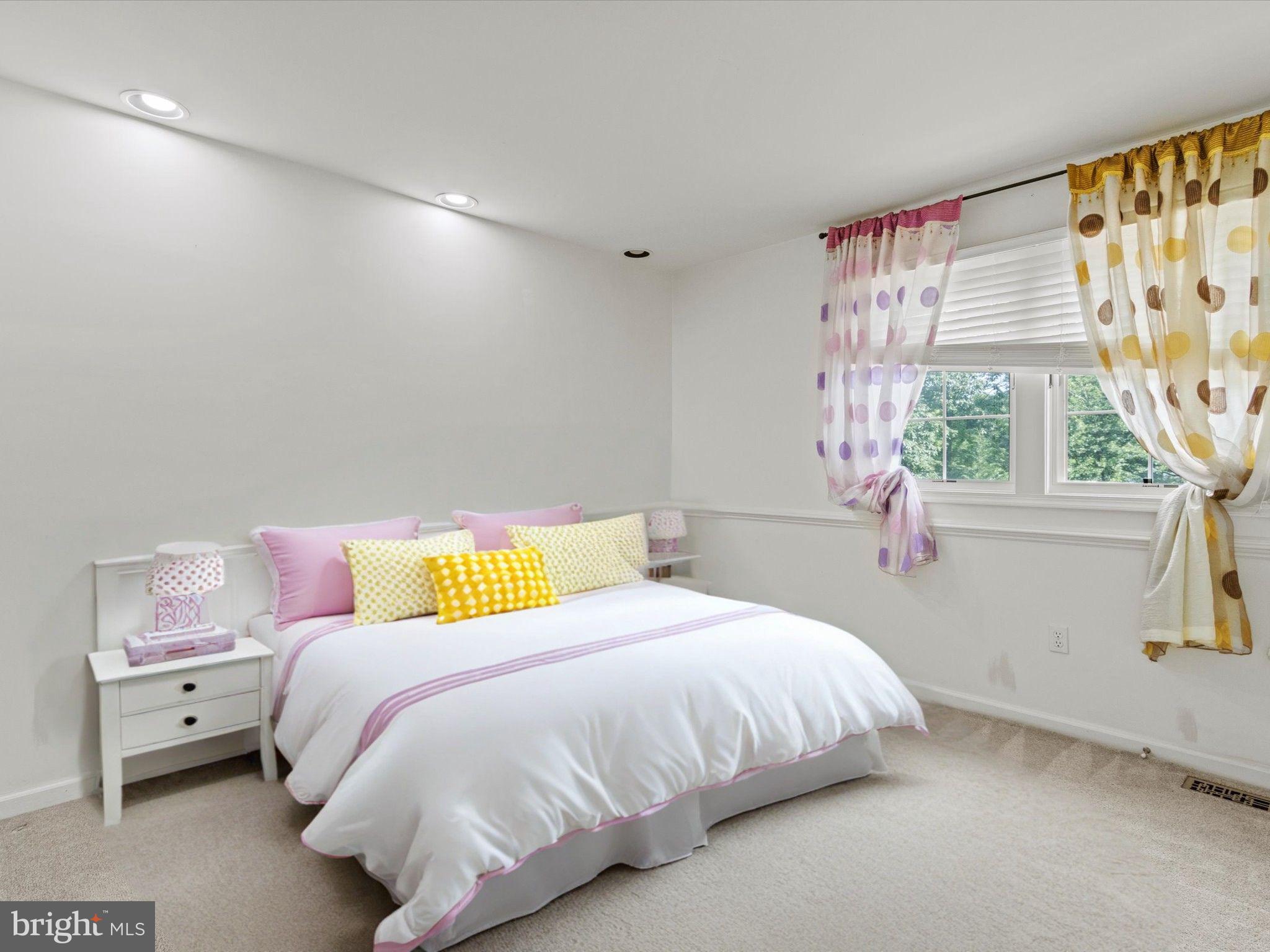 1505 Ridge Forest Way Hanover, MD 21076 - Photo 20 of 40 a bedroom with a bed and a window