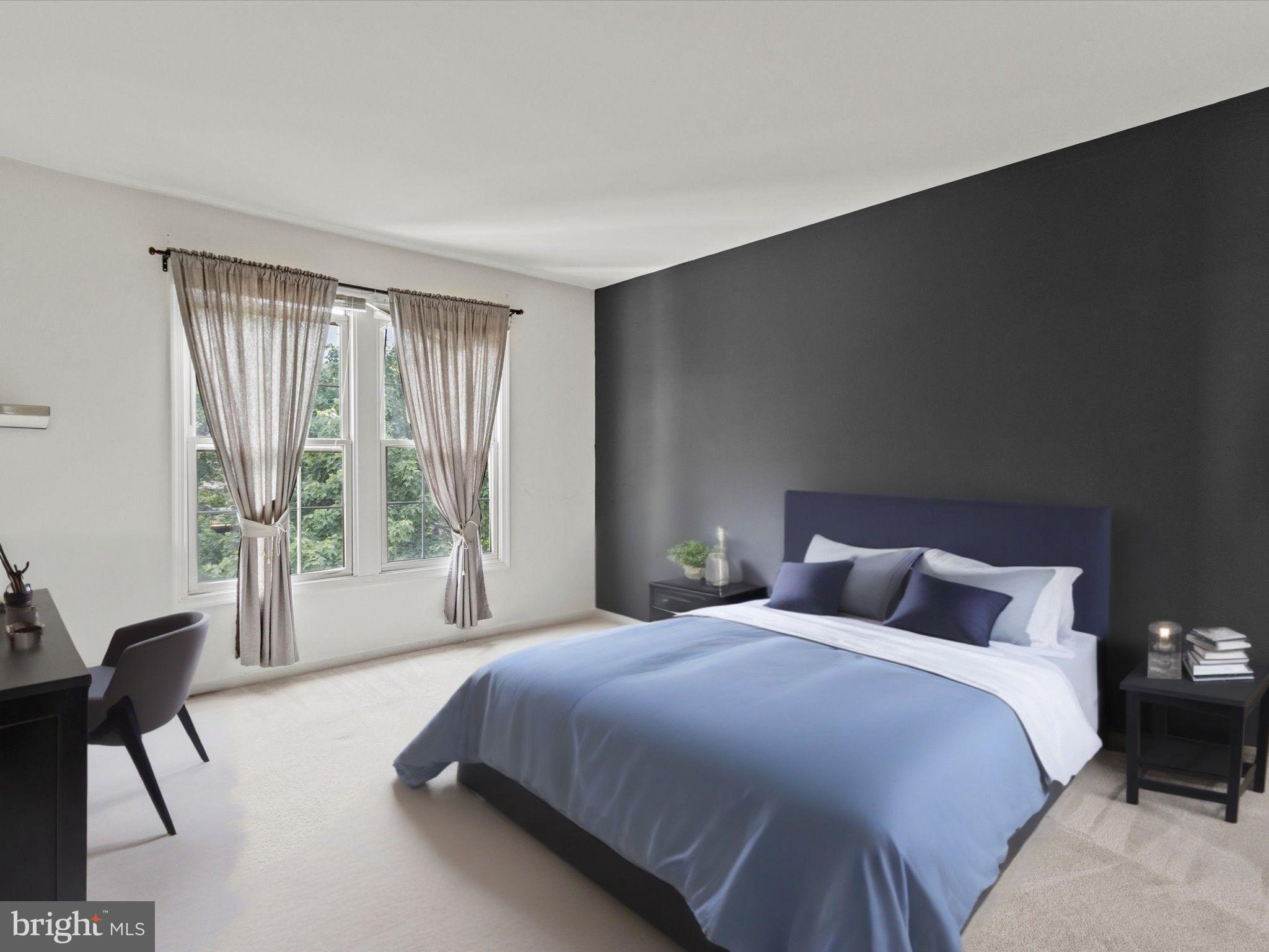 1505 Ridge Forest Way Hanover, MD 21076 - Photo 21 of 40 a bedroom with a bed and large window