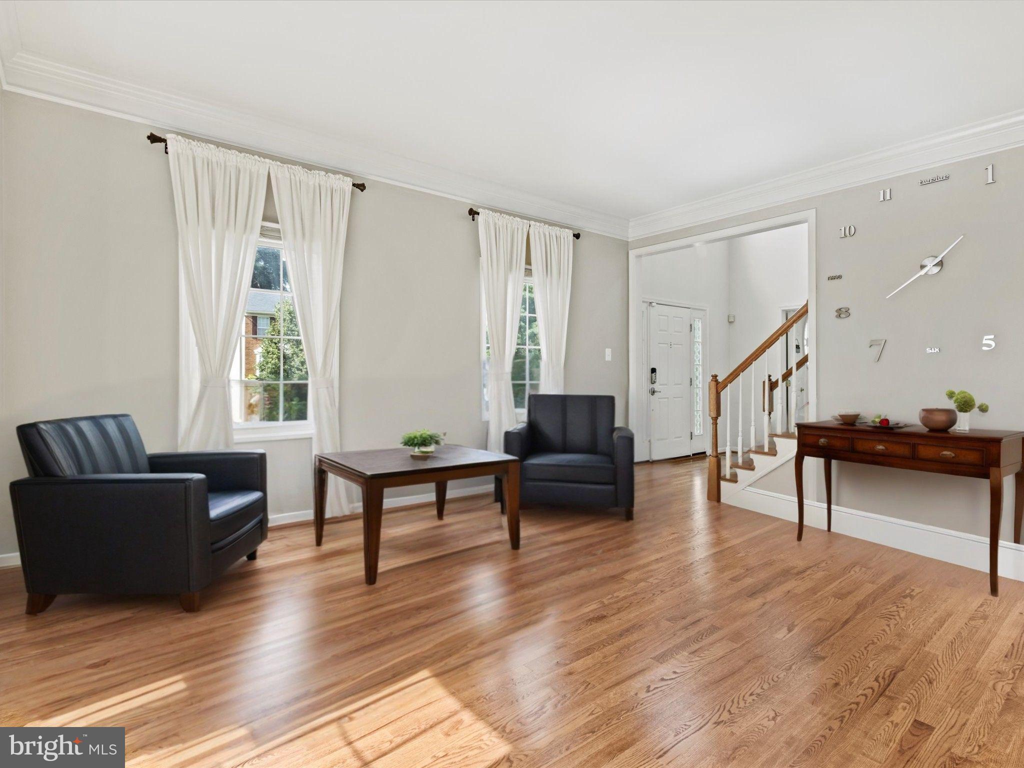 1505 Ridge Forest Way Hanover, MD 21076 - Photo 3 of 40 a living room with furniture and a wooden floor