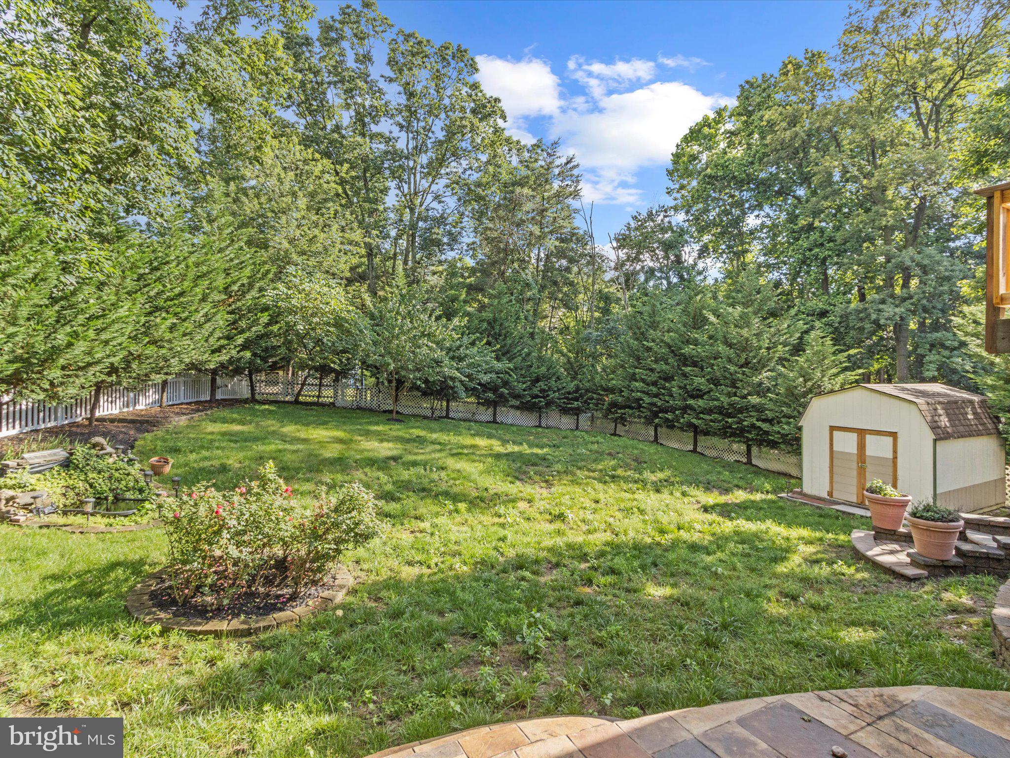 1505 Ridge Forest Way Hanover, MD 21076 - Photo 34 of 40 a view of a house with a yard