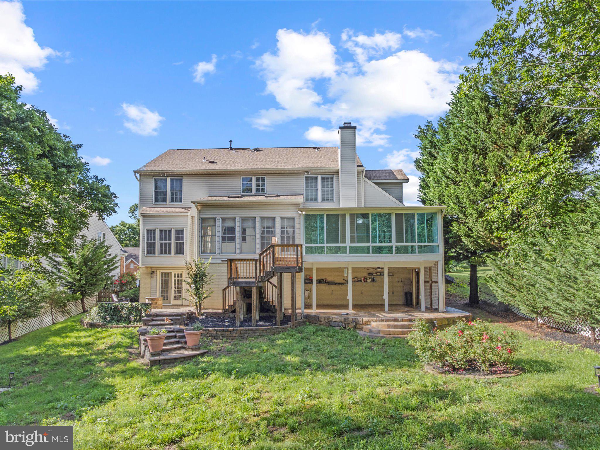 1505 Ridge Forest Way Hanover, MD 21076 - Photo 35 of 40 a view of an house with backyard porch and sitting area