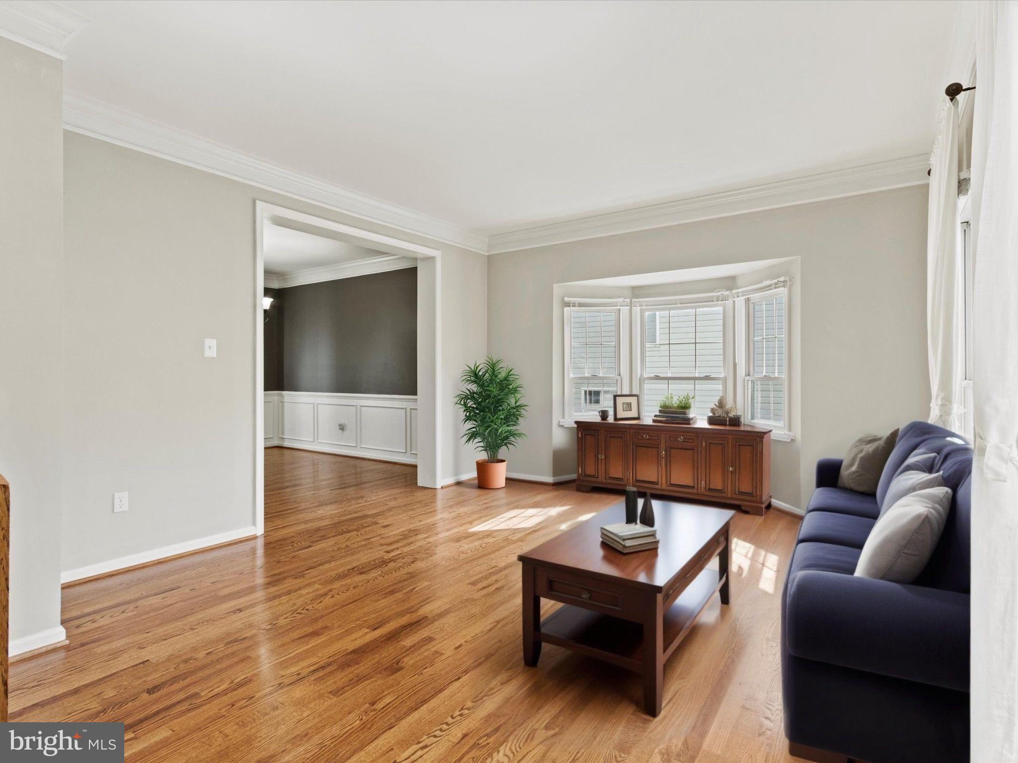 1505 Ridge Forest Way Hanover, MD 21076 - Photo 4 of 40 a living room with furniture and a wooden floor