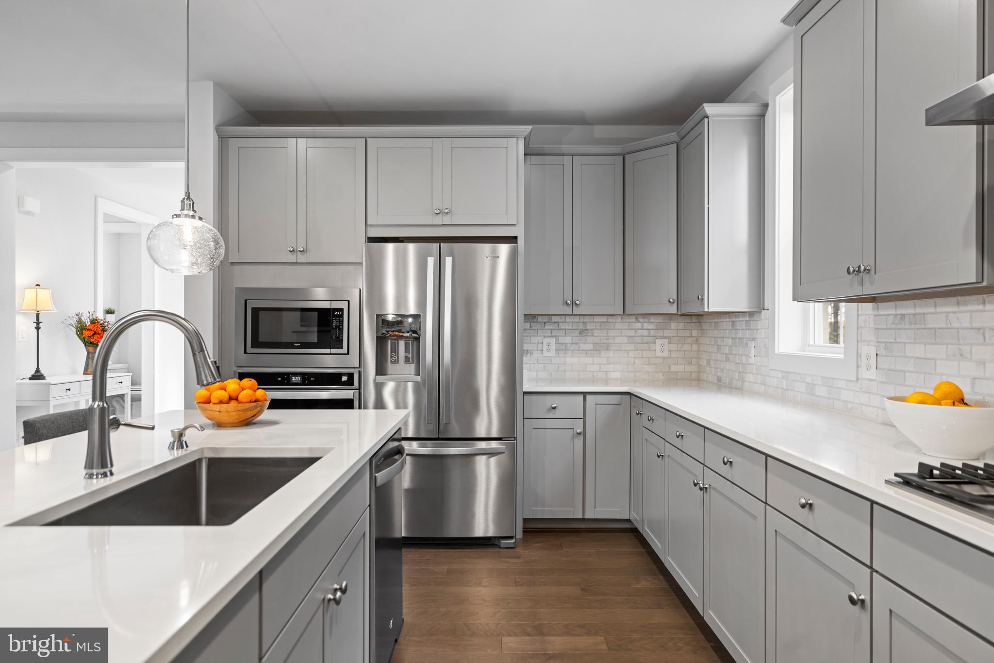 42064 Creighton Road Brambleton, VA 20148 - Photo 11 of 56 Beautiful Hardwood Floors on the Main Level