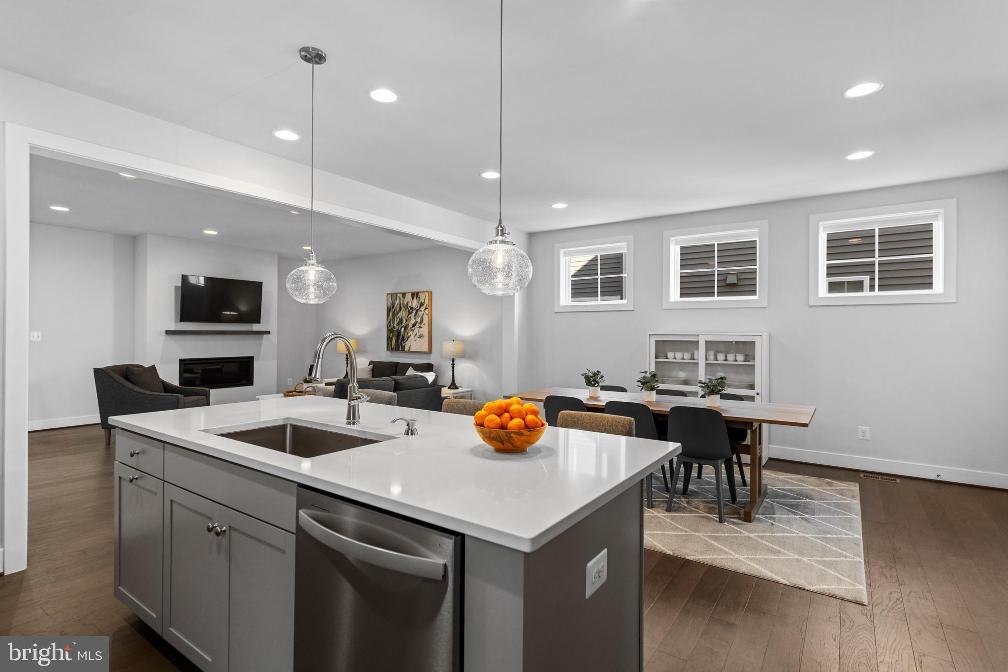 42064 Creighton Road Brambleton, VA 20148 - Photo 12 of 56 Kitchen Flows into the Family Room