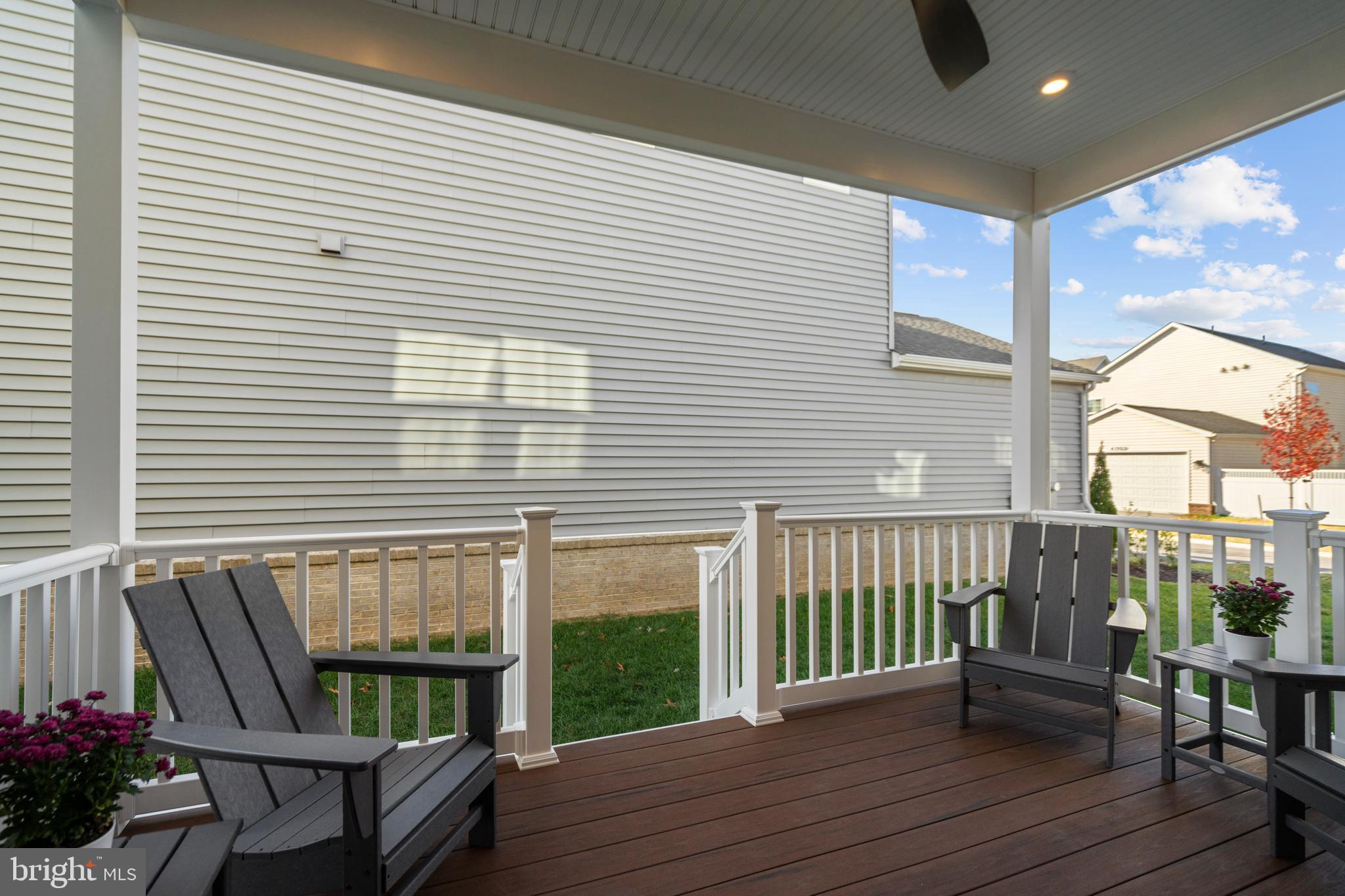 42064 Creighton Road Brambleton, VA 20148 - Photo 18 of 56 Enjoy Coffee or Drinks on the Covered Deck
