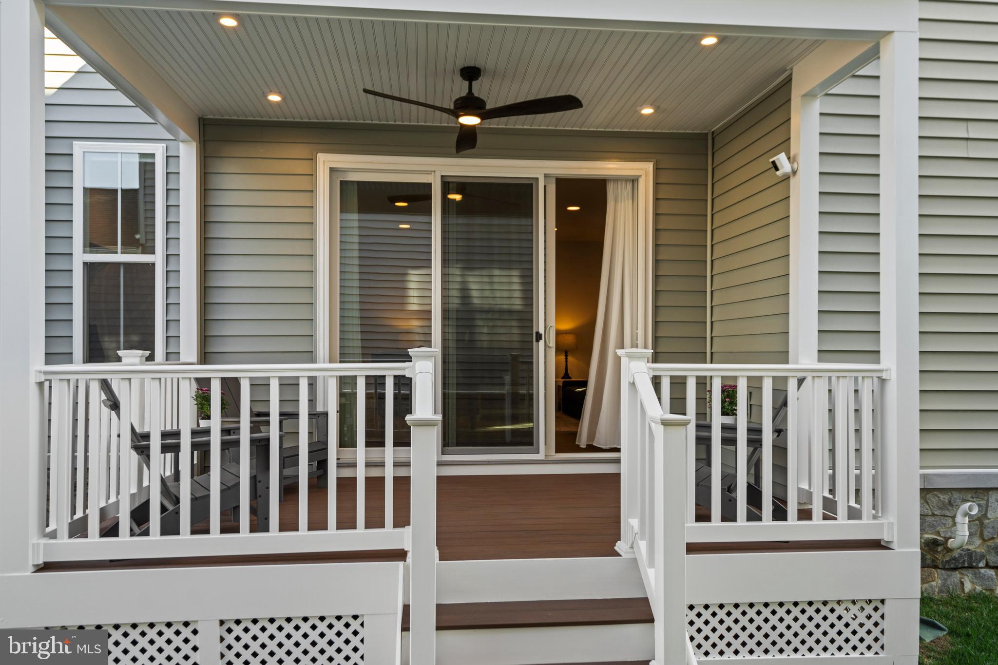 42064 Creighton Road Brambleton, VA 20148 - Photo 19 of 56 The Deck Flows into the Side Yard