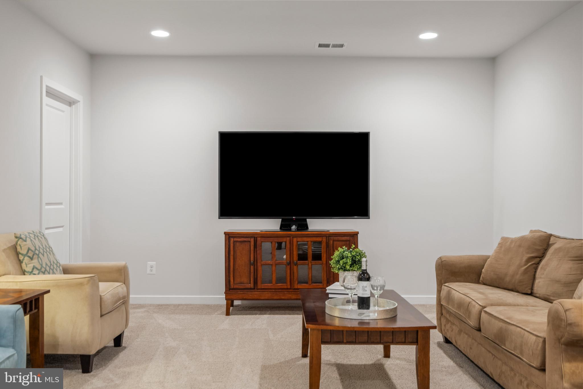 42064 Creighton Road Brambleton, VA 20148 - Photo 36 of 56 Enjoy Evenings in the Recreation Room with Family