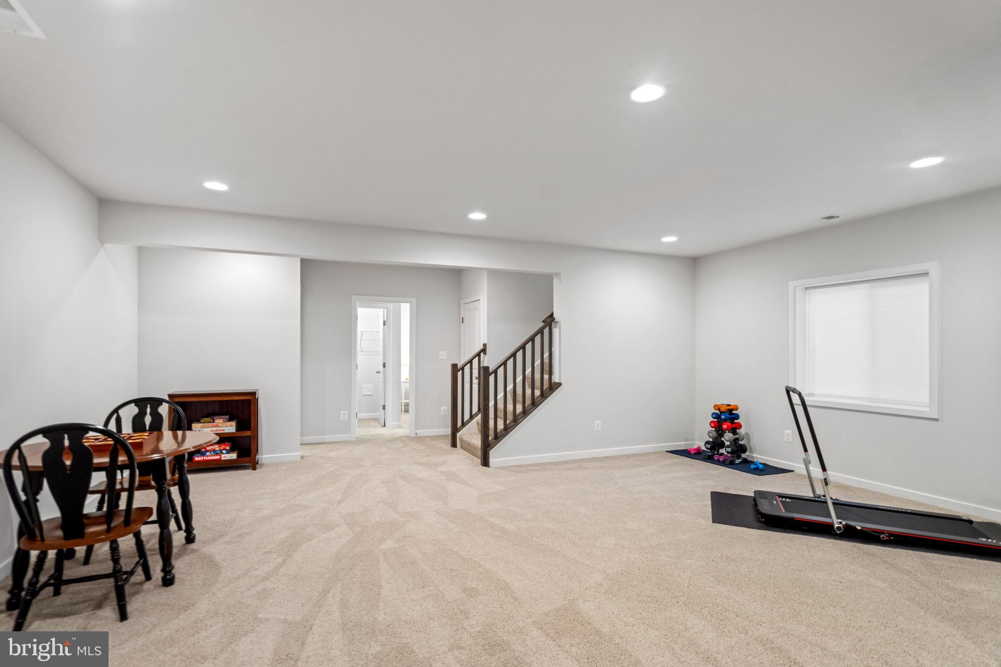 42064 Creighton Road Brambleton, VA 20148 - Photo 37 of 56 Recreation Room has Plenty of Room for a Home Gym