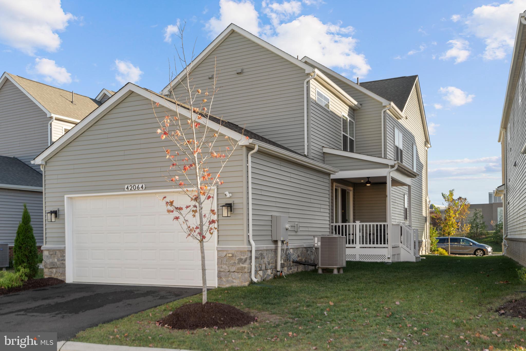42064 Creighton Road Brambleton, VA 20148 - Photo 42 of 56 Enjoy the Green Space Around the Home
