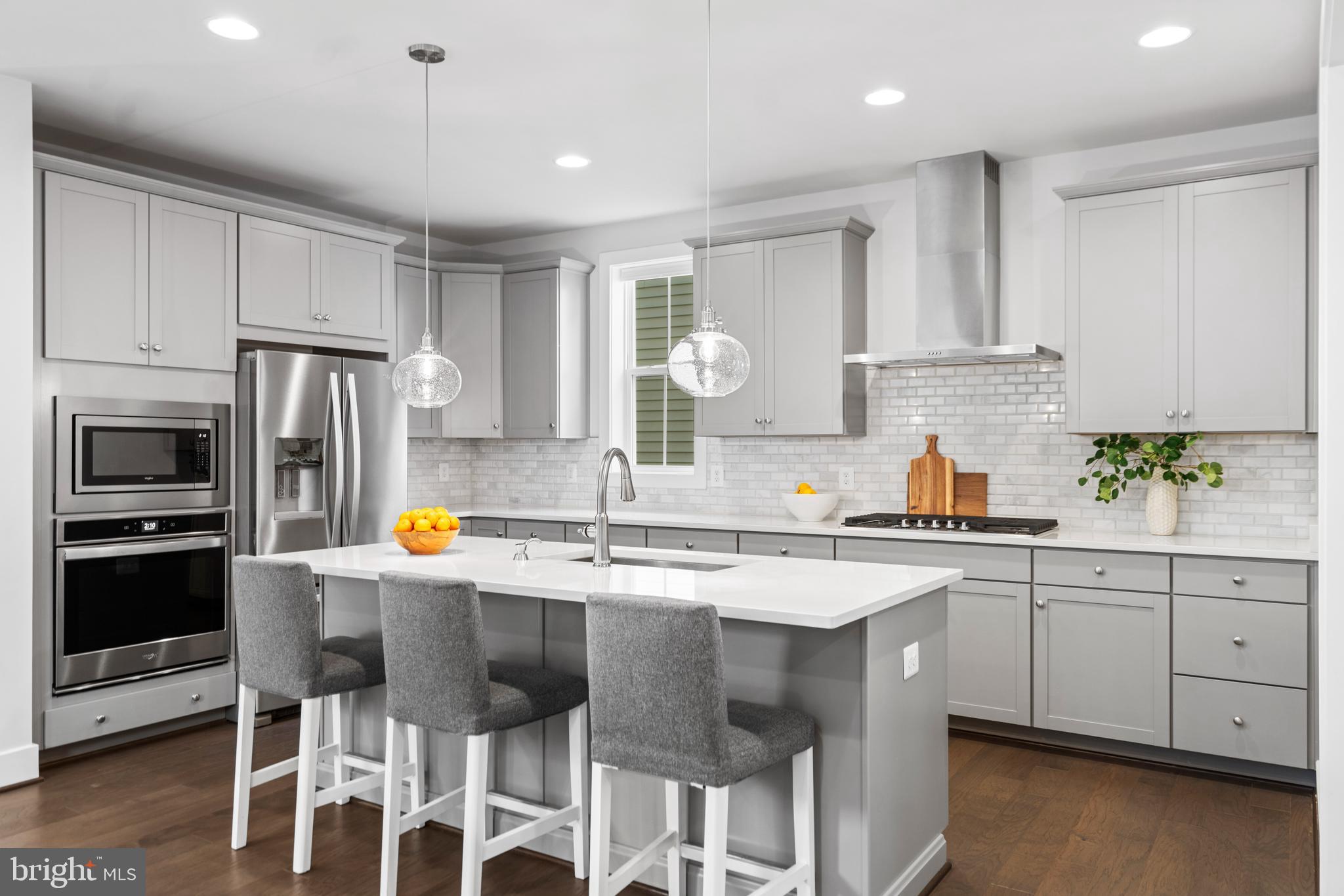 42064 Creighton Road Brambleton, VA 20148 - Photo 8 of 56 Quartz Countertops & Stainless Steel Appliances