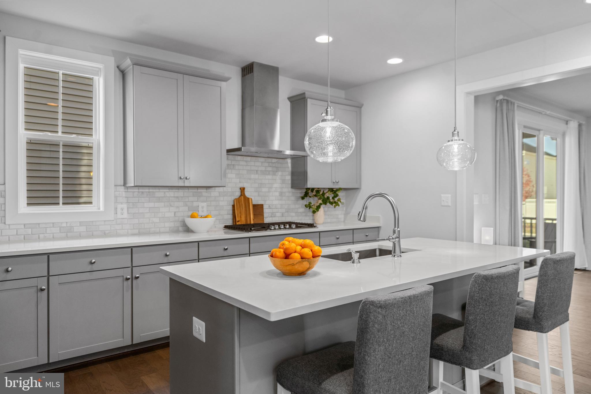 42064 Creighton Road Brambleton, VA 20148 - Photo 9 of 56 Stunning Gourmet Kitchen with Expansive Island