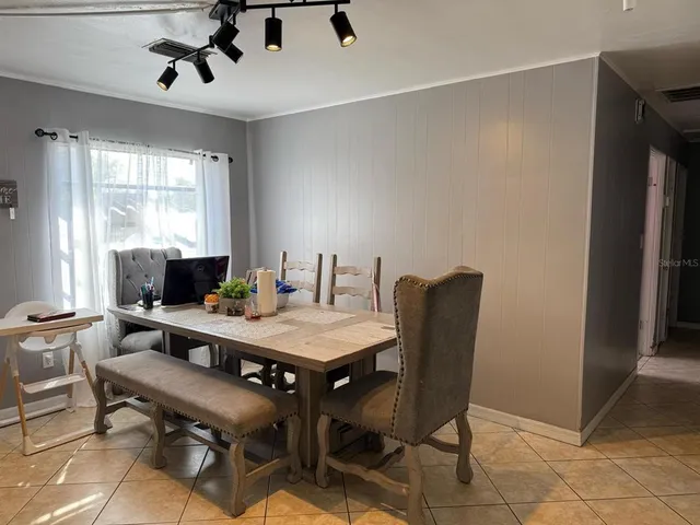 a view of a dining room with furniture