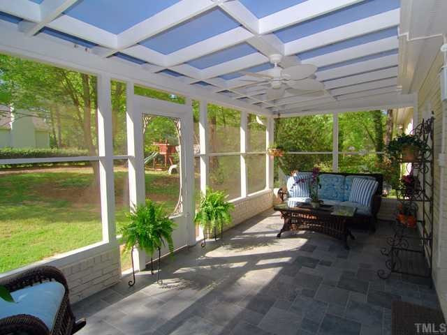 1201 Hunting Ridge Road Raleigh, NC 27615 - Photo 8 of 11 The large screened porch over looks the backyard and is located just off the family room and kitchen. This peaceful room is a great place to enjoy summer evenings. Screened Porch