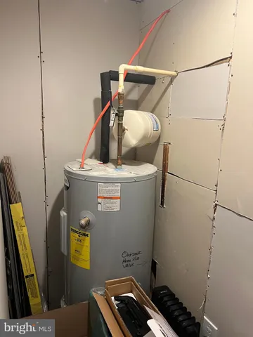 a bathroom with a toilet and a sink