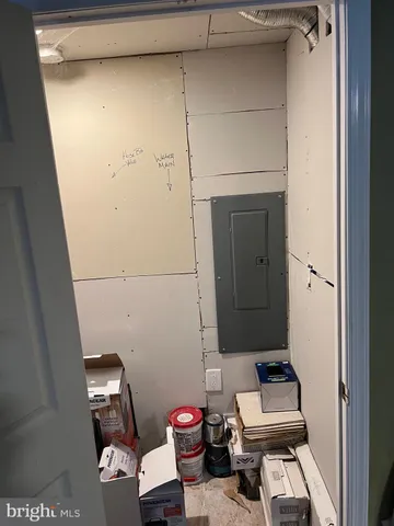 a close up view of a sink with granite countertop