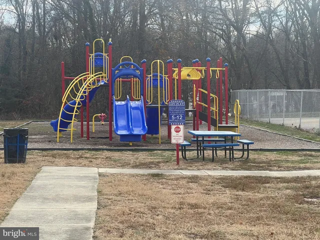 a view of swimming pool is middle in big