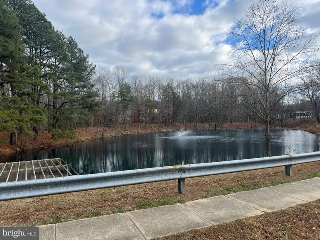 a front view of a house with a large window