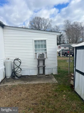 a view of backyard and patio