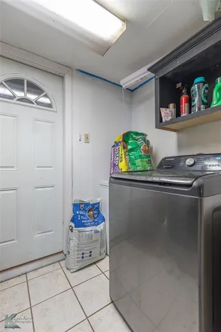 a utility room with washer and dryer