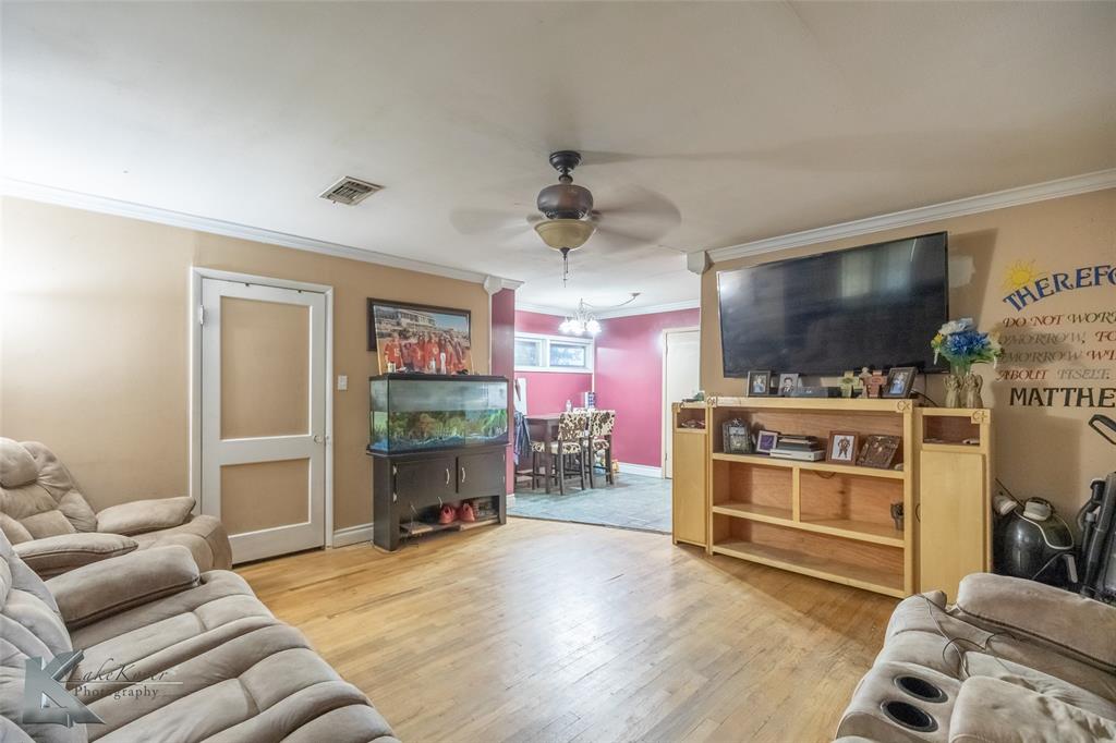 1649 South 16th Street Abilene, TX 79602 - Photo 10 of 24 a living room with furniture and a flat screen tv