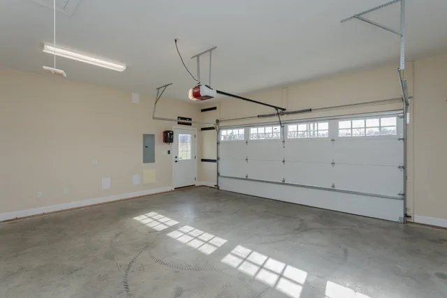 a view of house with outdoor space and parking