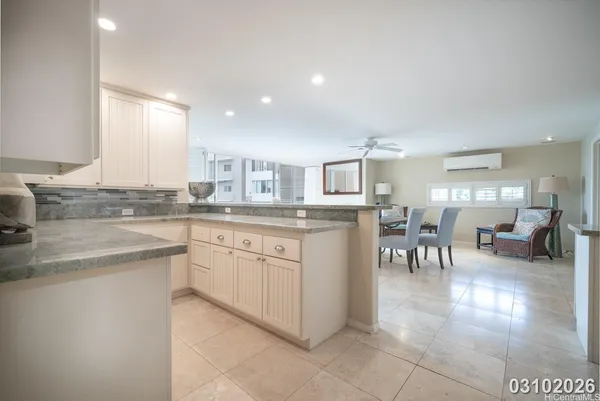 a kitchen with cabinets and sink