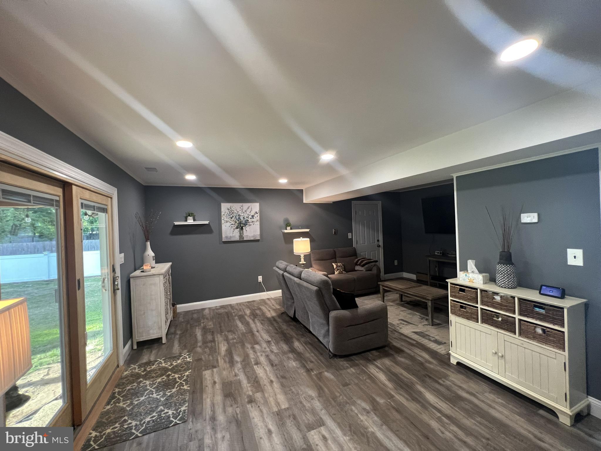 29 Tar Heels Road Hamilton, NJ 08619 - Photo 9 of 22 Family Room with Sliding Doors to Covered Patio