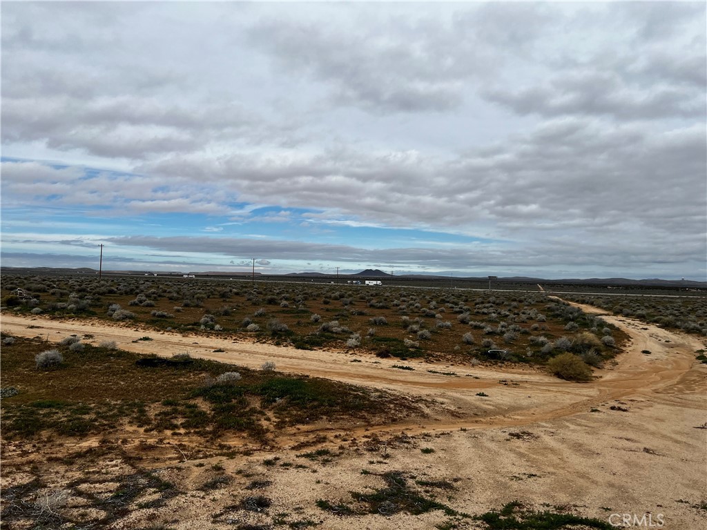 0 Kramer Station Road Boron, CA 93516 - Photo 16 of 19 a view of a large body of water and mountain in back