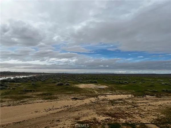 a view of a ocean with beach