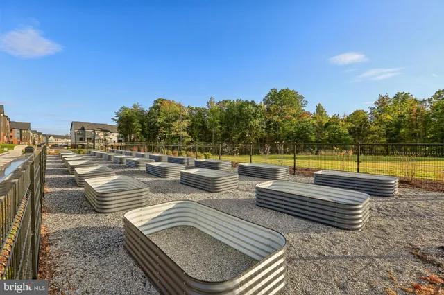 a view of swimming pool with outdoor seating and yard in the back