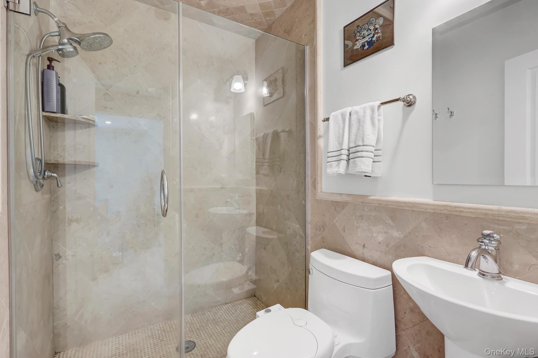 360 Westminster Road Cedarhurst, NY 11516 - Photo 18 of 31 FIRST FLOOR FULL BATHROOM WITH SHOWER