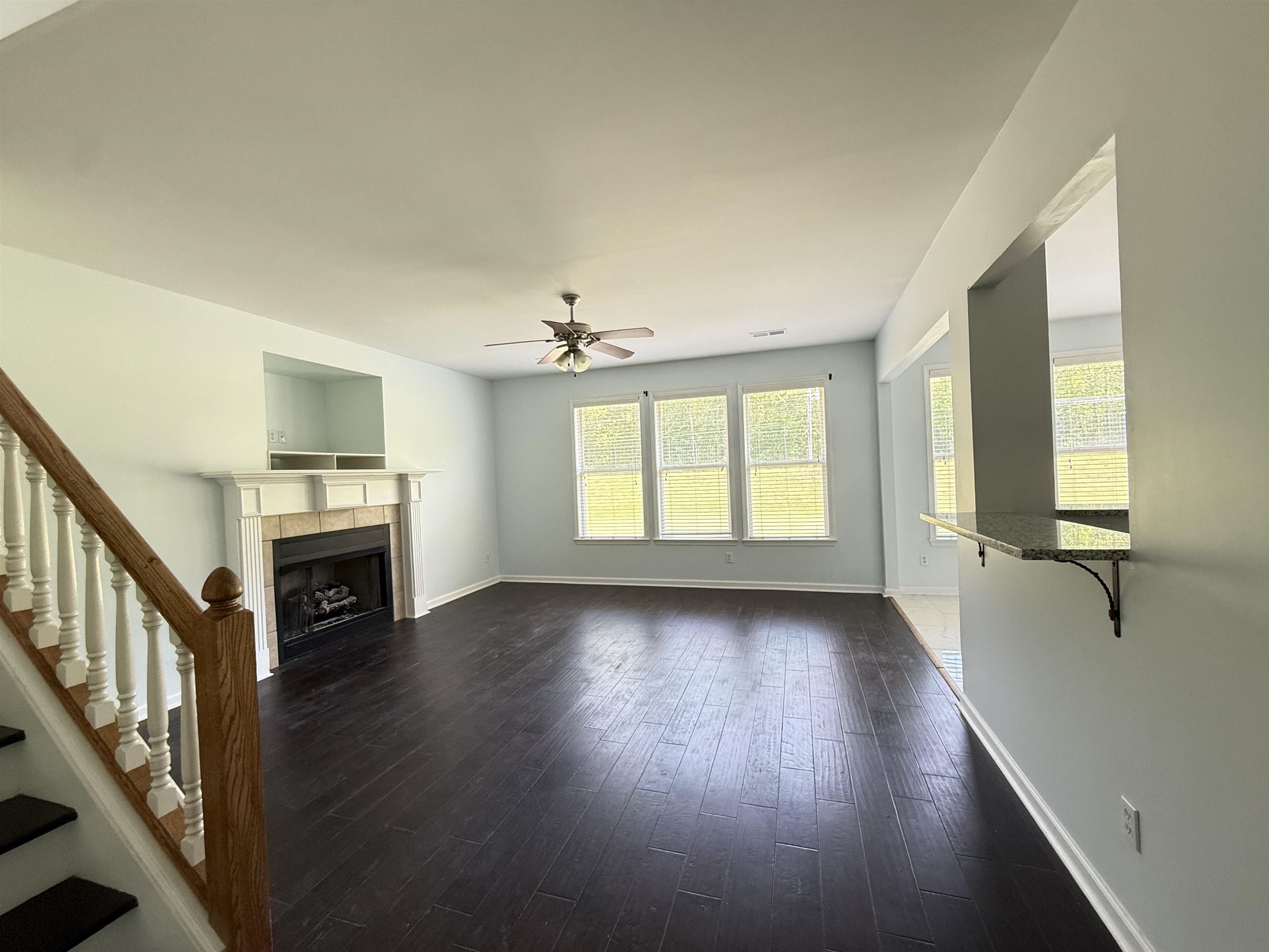 4560 Model Cove Bartlett, TN 38002 - Photo 9 of 18 wooden floor in an empty room with a window