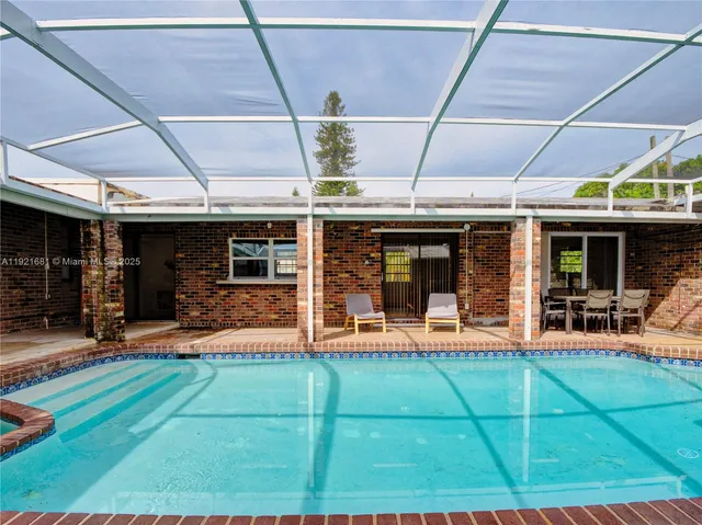 a view of a house with porch and sitting area