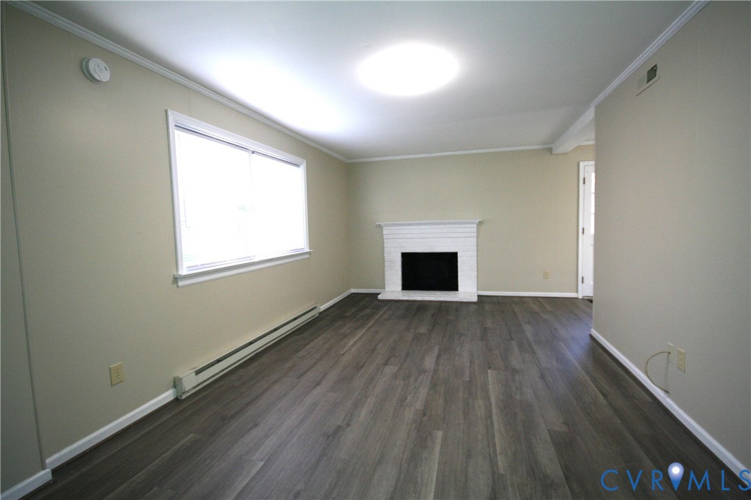 12141 Old Buckingham Road Midlothian, VA 23113 - Photo 34 of 39 Spacious interior featuring wood-finish flooring,