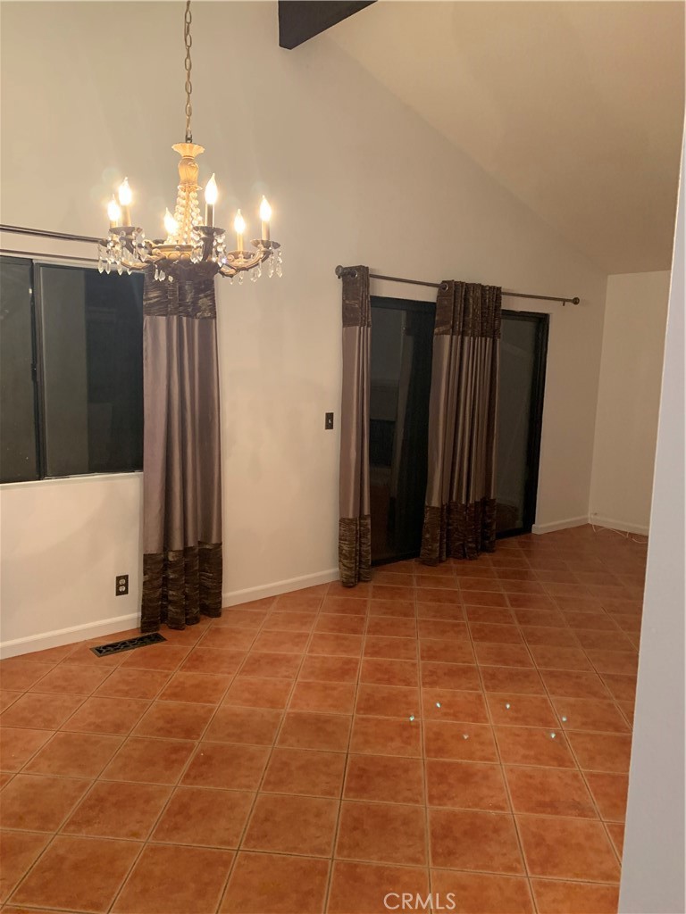 5246 Calderon Road Woodland Hills, CA 91364 - Photo 18 of 50 a view of a livingroom with a chandelier