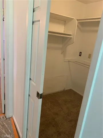 a view of a lake with a house