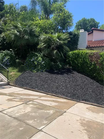 a view of backyard with green space