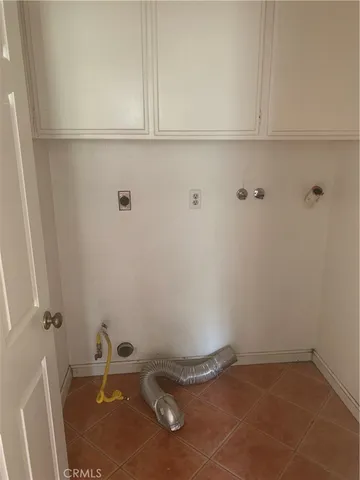 a bathroom with a sink mirror vanity and toilet