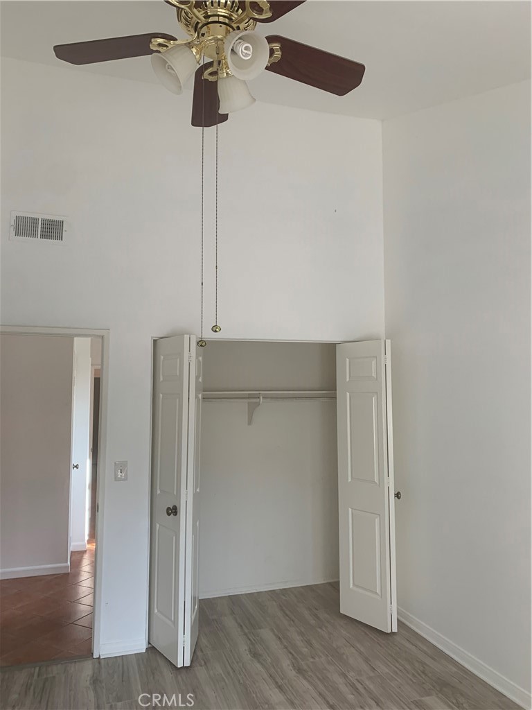 5246 Calderon Road Woodland Hills, CA 91364 - Photo 35 of 50 a view of an empty room with wooden floor