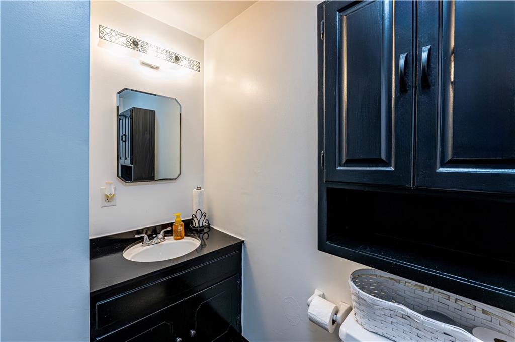 23 Seneca Drive Greensburg, PA 15601 - Photo 22 of 36 a bathroom with a sink and a mirror