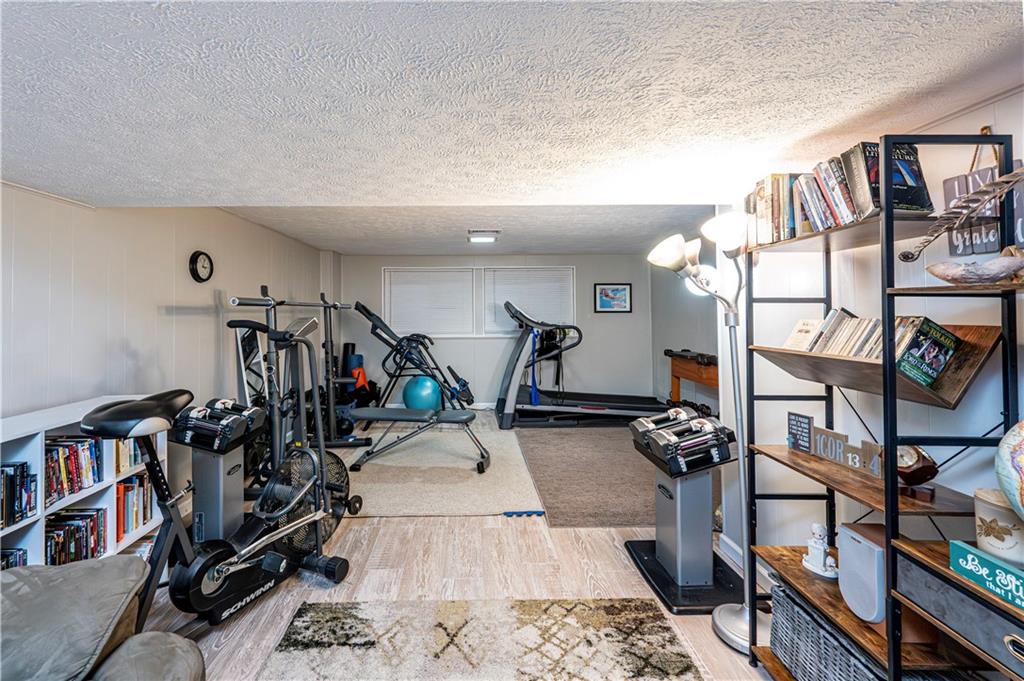 23 Seneca Drive Greensburg, PA 15601 - Photo 32 of 36 a view of a room with gym equipment
