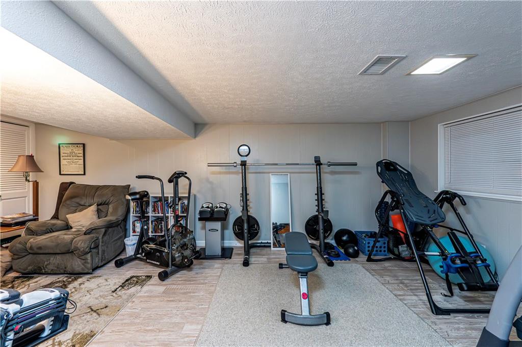 23 Seneca Drive Greensburg, PA 15601 - Photo 33 of 36 a view of a room with gym equipment