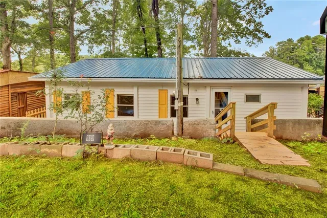 front view of a house with yard
